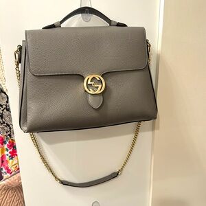 Pristine gray Gucci purse. Carried only 1-2 times.